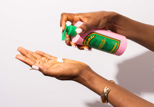 Froday hydrating leave-in conditioner being dispensed into hands showing lightweight texture