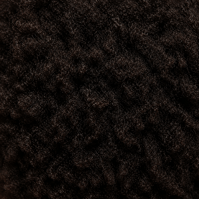 Close-up of coily and kinky textured hair with natural afro texture